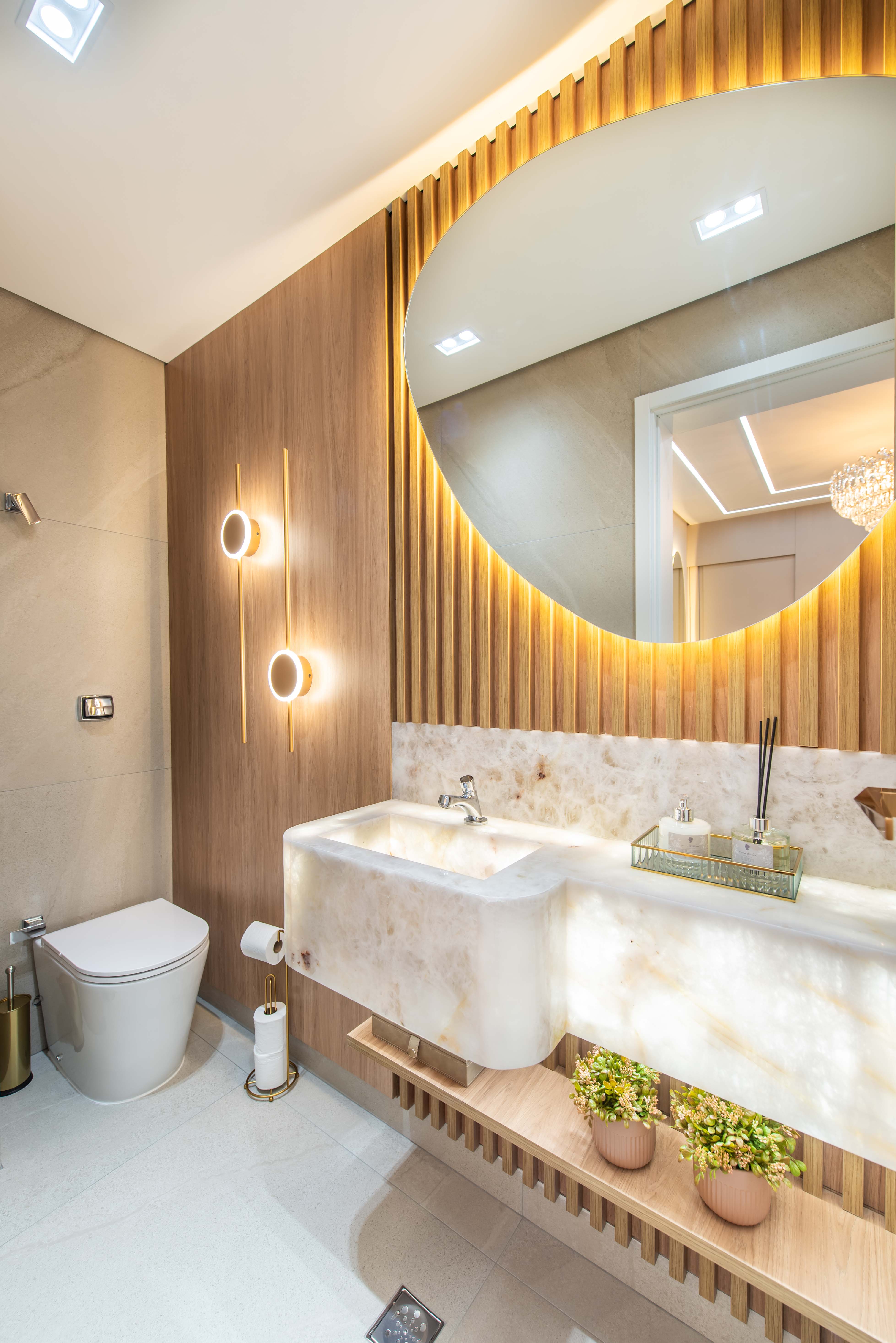 Lavabo do consultório em ônix iluminado